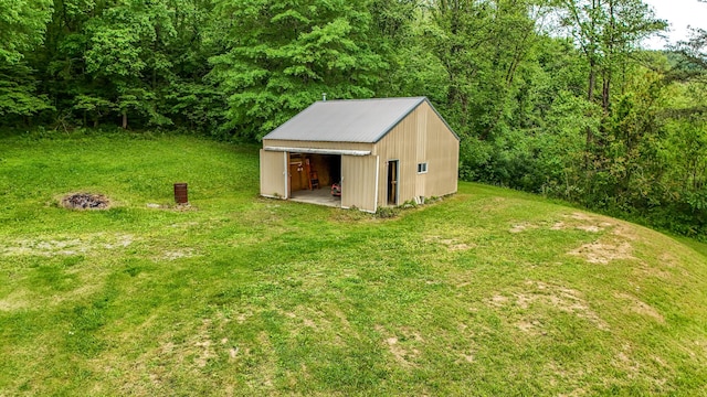 315 Sukey Hollow Rd, Williamsburg, KY 40769 - view of pole building featuring a lawn and a wooded view