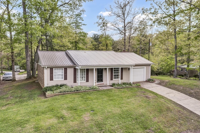 324 Circle Dr, Morehead, KY 40351 - ranch-style home featuring an attached garage, driveway, a porch, a front lawn, and metal roof