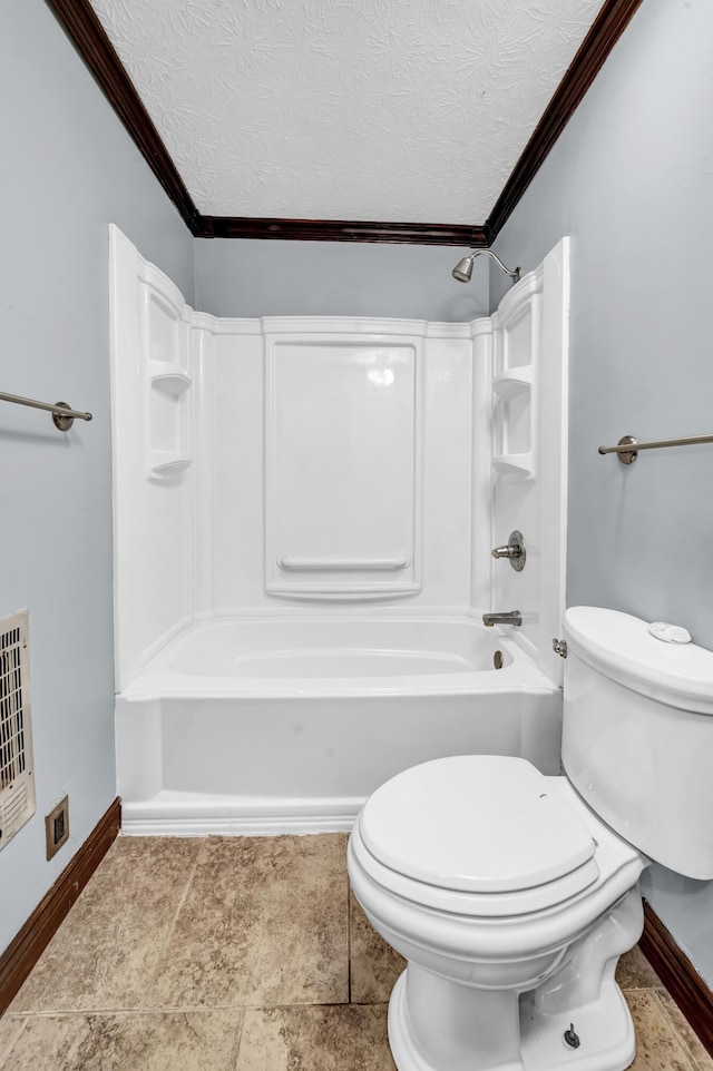 324 Circle Dr, Morehead, KY 40351 - bathroom with ornamental molding, toilet, shower / tub combination, baseboards, and a textured ceiling