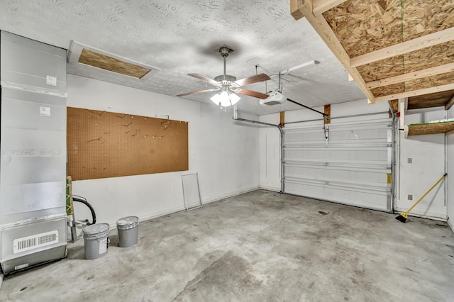 324 Circle Dr, Morehead, KY 40351 - garage featuring a garage door opener and a ceiling fan