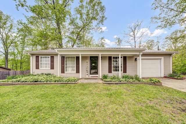 324 Circle Dr, Morehead, KY 40351 - single story home featuring concrete driveway, a garage, and covered porch