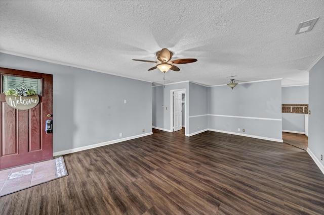 324 Circle Dr, Morehead, KY 40351 - foyer with dark wood finished floors, a ceiling fan, baseboards, and a textured ceiling