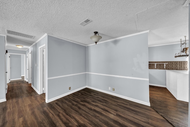 324 Circle Dr, Morehead, KY 40351 - unfurnished room featuring wood finished floors, crown molding, baseboards, and a textured ceiling