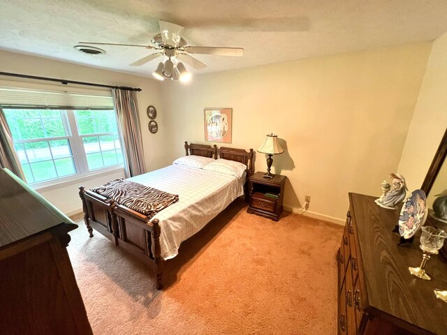4758 Cloverlick Rd, Cumberland, KY 40823 - bedroom featuring light colored carpet, baseboards, and a ceiling fan