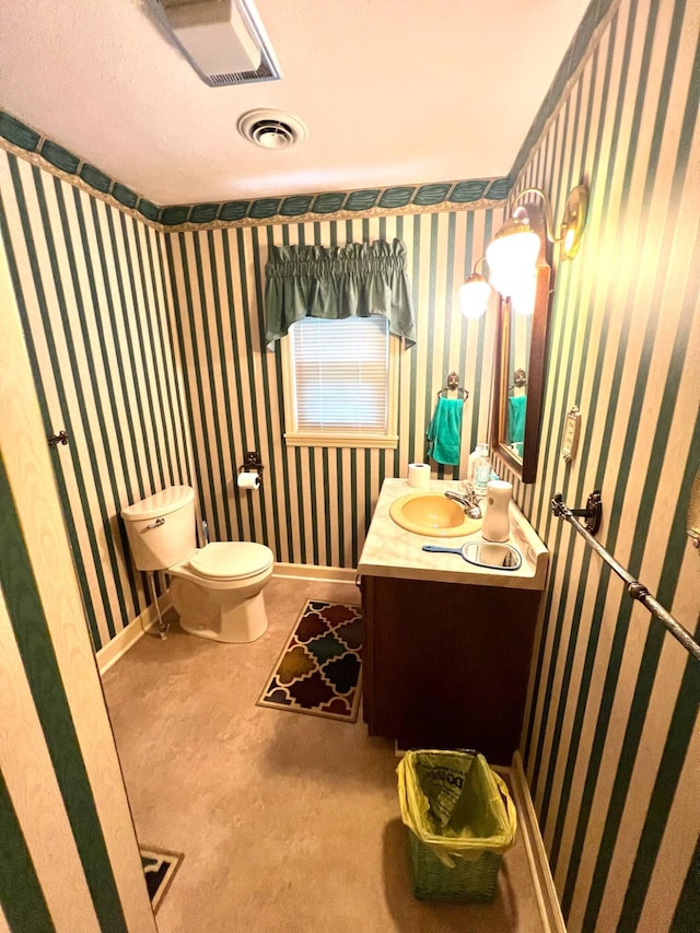 4758 Cloverlick Rd, Cumberland, KY 40823 - half bathroom with toilet, vanity, baseboards, and wallpapered walls
