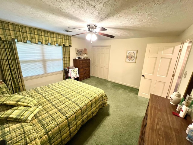 4758 Cloverlick Rd, Cumberland, KY 40823 - bedroom featuring carpet floors, a textured ceiling, a closet, a ceiling fan, and baseboards