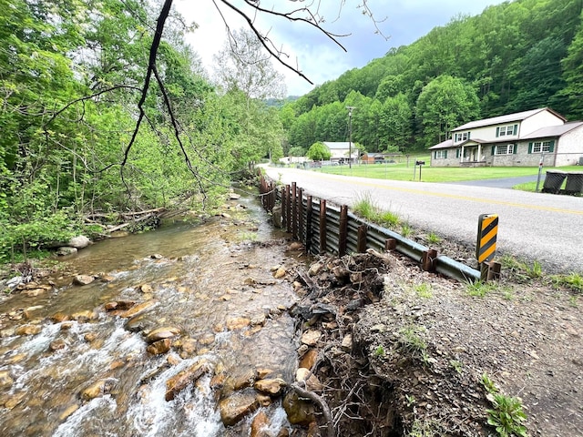4758 Cloverlick Rd, Cumberland, KY 40823 - view of asphalt road with a view of trees