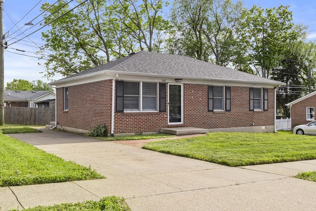 340 Wise Dr, Wilmore, KY 40390 - bungalow-style home featuring brick siding, roof with shingles, and crawl space