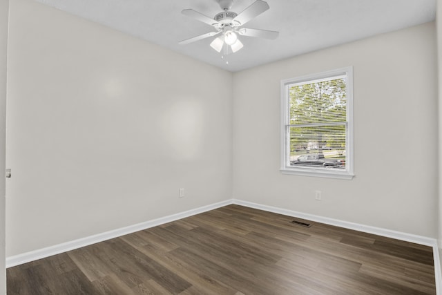 340 Wise Dr, Wilmore, KY 40390 - spare room with dark wood finished floors, baseboards, and a ceiling fan