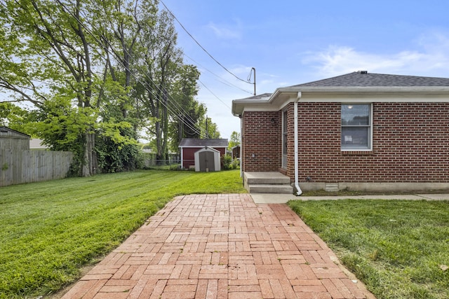 340 Wise Dr, Wilmore, KY 40390 - view of yard with a shed, an outbuilding, and a patio