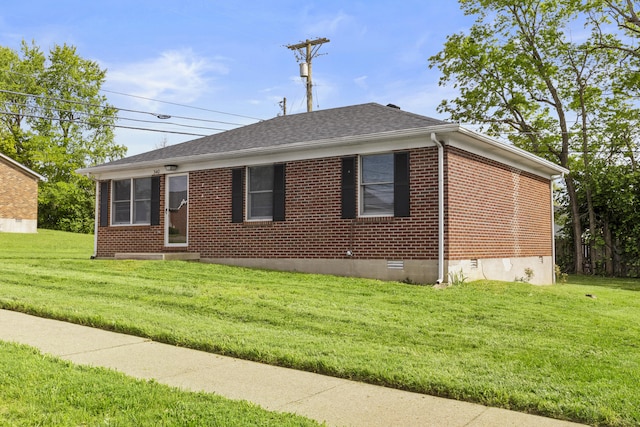 340 Wise Dr, Wilmore, KY 40390 - view of side of property featuring a yard, brick siding, roof with shingles, and crawl space