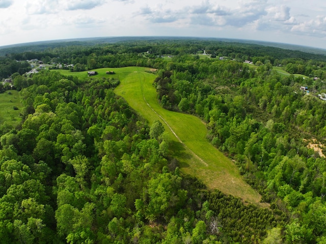 drone / aerial view of a heavily wooded area