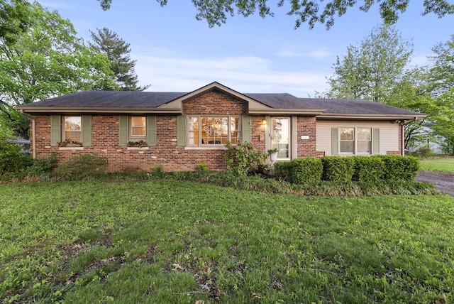 2310 Tulsa Rd, Lexington, KY 40503 - single story home featuring brick siding and a front lawn