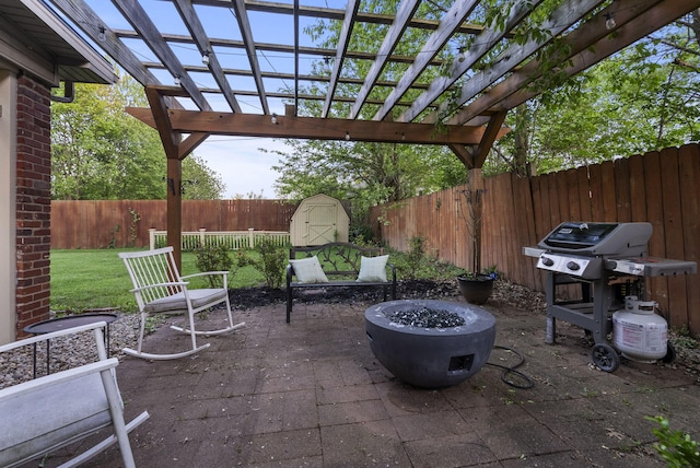 2310 Tulsa Rd, Lexington, KY 40503 - view of patio / terrace featuring a storage shed, an outdoor structure, area for grilling, an outdoor fire pit, and a pergola