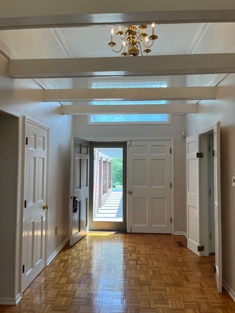 1819 N 27th Hwy, Cynthiana, KY 41031 - entrance foyer featuring a chandelier and baseboards