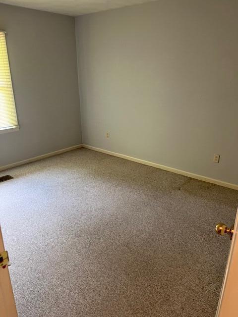 1819 N 27th Hwy, Cynthiana, KY 41031 - unfurnished room with baseboards and light colored carpet
