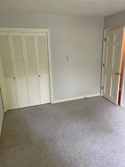 1819 N 27th Hwy, Cynthiana, KY 41031 - unfurnished bedroom with carpet, baseboards, and a closet