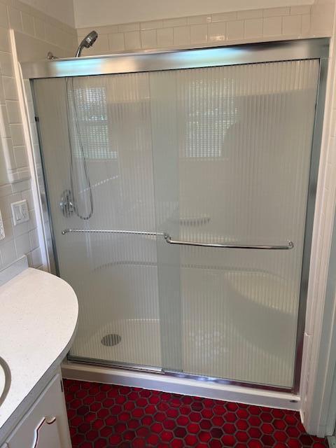 1819 N 27th Hwy, Cynthiana, KY 41031 - full bath featuring vanity, a shower stall, and tile walls