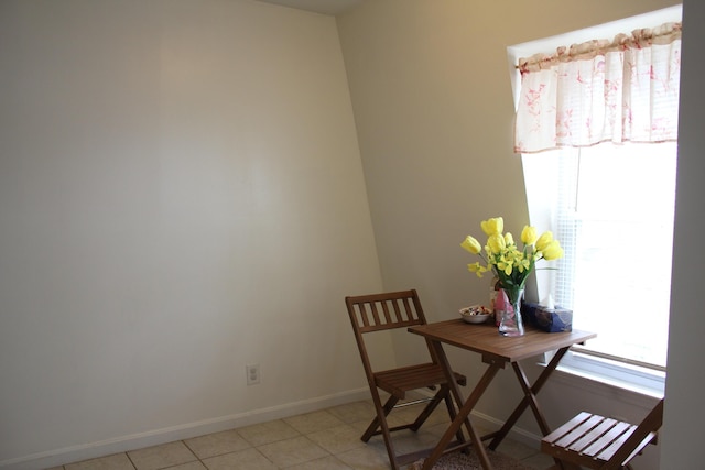 dining space with baseboards