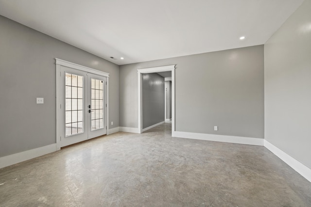 324 Hays Mays Rd, Perryville, KY 40468 - spare room with french doors, concrete floors, baseboards, and recessed lighting