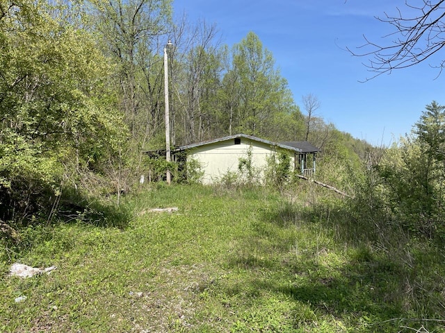 654 Napier Hollow Rd, Manchester, KY 40962 - view of yard with a wooded view