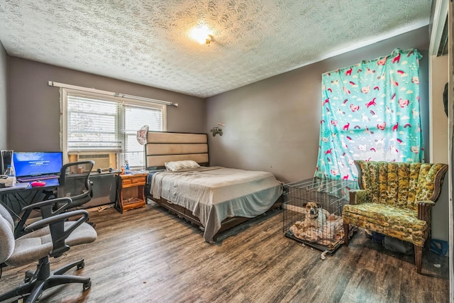 3202 W Cumberland Ave, Middlesboro, KY 40965 - bedroom with a textured ceiling, wood finished floors, and an office area