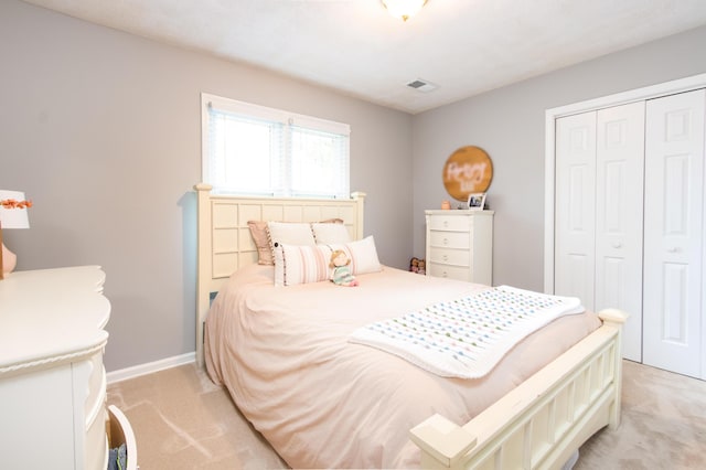 3476 Grasmere Dr, Lexington, KY 40503 - bedroom with light colored carpet, a closet, and baseboards