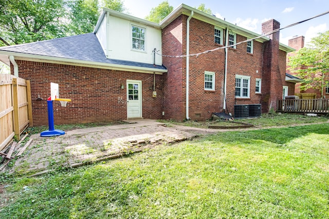 3476 Grasmere Dr, Lexington, KY 40503 - rear view of house featuring brick siding, a chimney, roof with shingles, and a patio area