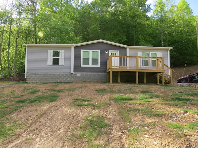 3590 Ky 233, Gray, KY 40734 - manufactured / mobile home featuring a wooden deck and crawl space