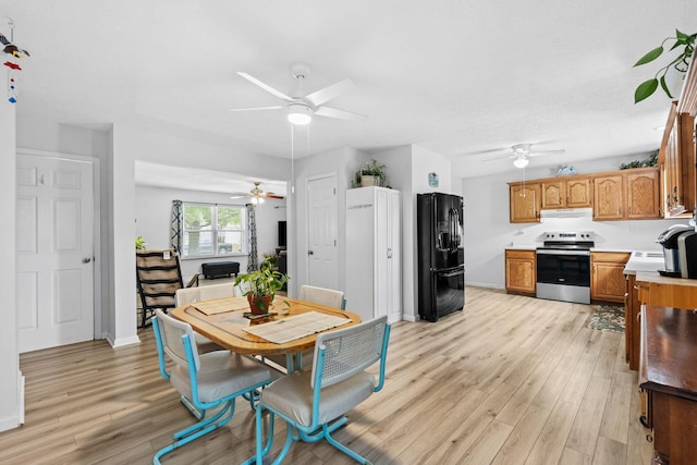 129 Bay Hill Dr, Winchester, KY 40391 - dining area with ceiling fan, light wood-style flooring, and baseboards