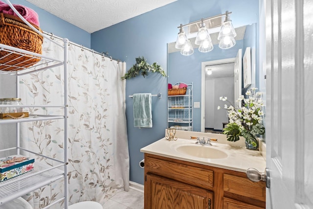 129 Bay Hill Dr, Winchester, KY 40391 - bathroom with vanity, curtained shower, a textured ceiling, and tile patterned flooring