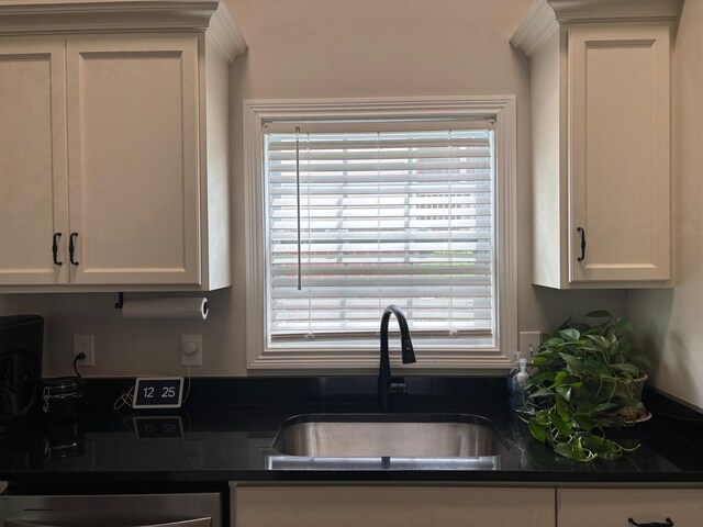 875 Ridgeview Dr, Frankfort, KY 40601 - kitchen with a sink, white cabinets, dark countertops, and plenty of natural light