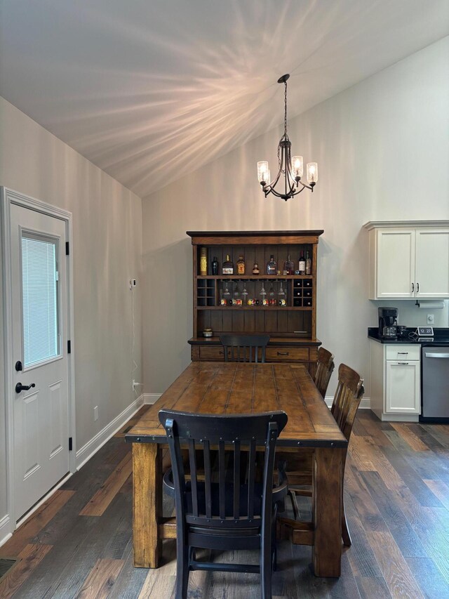 875 Ridgeview Dr, Frankfort, KY 40601 - dining room with a chandelier, vaulted ceiling, dark wood finished floors, and baseboards