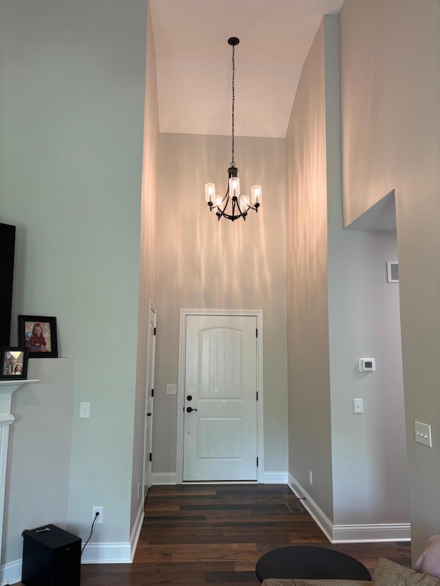 875 Ridgeview Dr, Frankfort, KY 40601 - foyer with a towering ceiling, a chandelier, dark wood-style floors, and baseboards