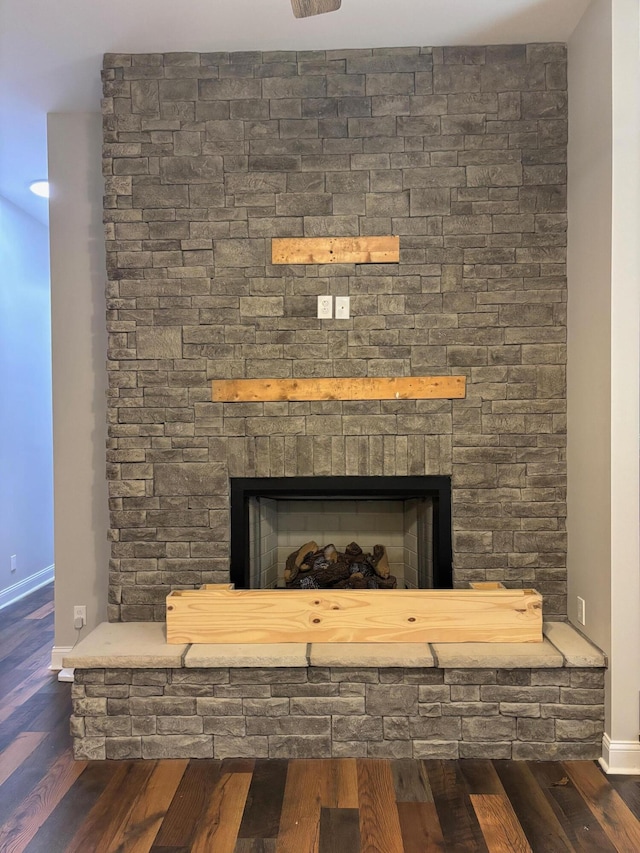 875 Ridgeview Dr, Frankfort, KY 40601 - detailed view of a stone fireplace, baseboards, and wood finished floors