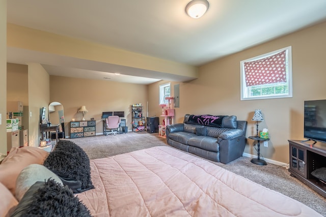 carpeted living room featuring baseboards