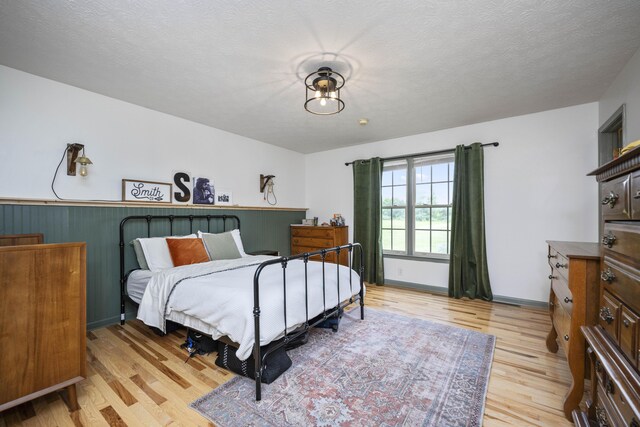 bedroom featuring light wood-type flooring