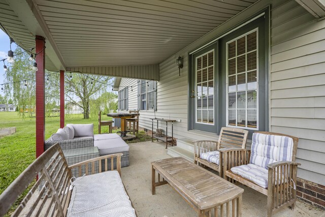 view of grassy yard with a storage unit, an outdoor fire pit, and an outdoor structure