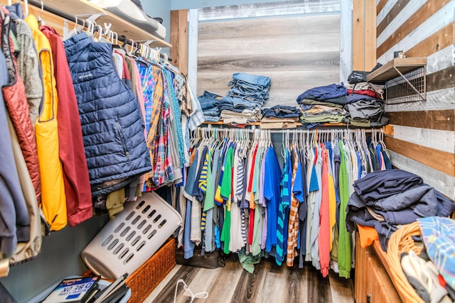 spacious closet featuring wood finished floors