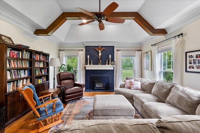 1183 The Ridings, Winchester, KY 40391 - living room featuring ceiling fan, wood finished floors, a brick fireplace, lofted ceiling, and ornamental molding
