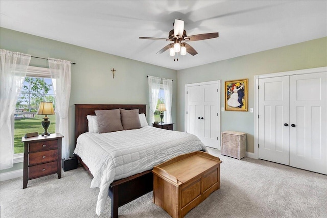 1183 The Ridings, Winchester, KY 40391 - bedroom featuring light colored carpet, multiple closets, baseboards, and ceiling fan