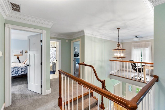 1183 The Ridings, Winchester, KY 40391 - corridor featuring a chandelier, an upstairs landing, carpet flooring, crown molding, and baseboards