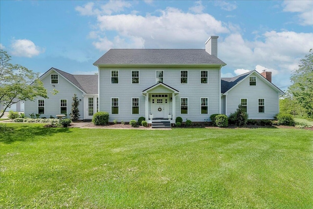 1183 The Ridings, Winchester, KY 40391 - view of front of home featuring a front lawn and a chimney