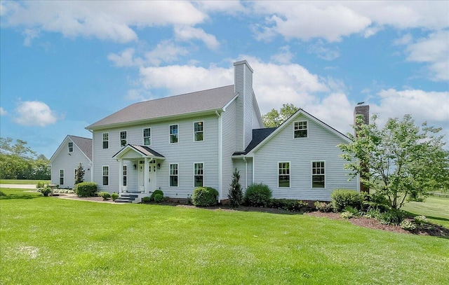 1183 The Ridings, Winchester, KY 40391 - view of front of home with a front yard and a chimney