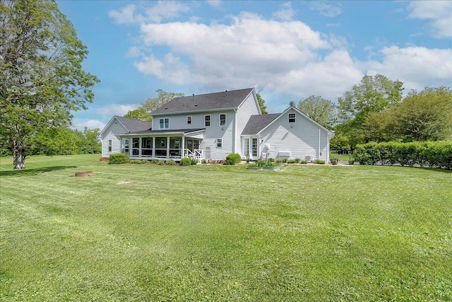 1183 The Ridings, Winchester, KY 40391 - rear view of property with a lawn and a sunroom