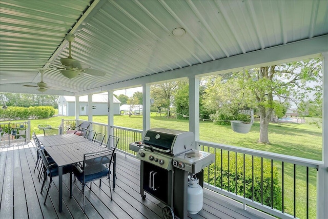 1183 The Ridings, Winchester, KY 40391 - deck with outdoor dining area, a ceiling fan, a grill, and a lawn