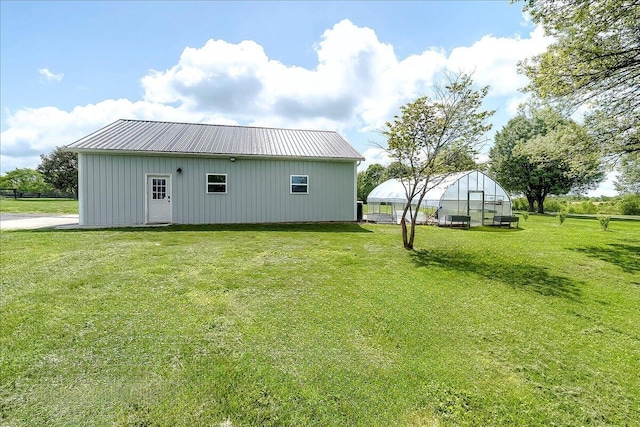 1183 The Ridings, Winchester, KY 40391 - rear view of house featuring an outbuilding, a yard, and a greenhouse