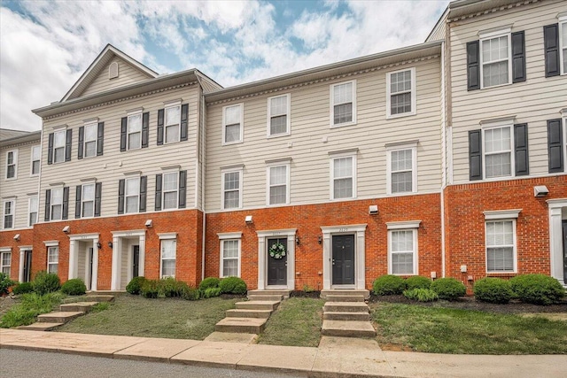 2627 Calgary, Lexington, KY 40509 - townhome / multi-family property featuring brick siding