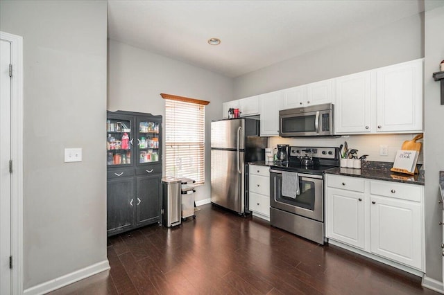 2627 Calgary, Lexington, KY 40509 - kitchen with appliances with stainless steel finishes, a sink, white cabinets, decorative backsplash, and recessed lighting
