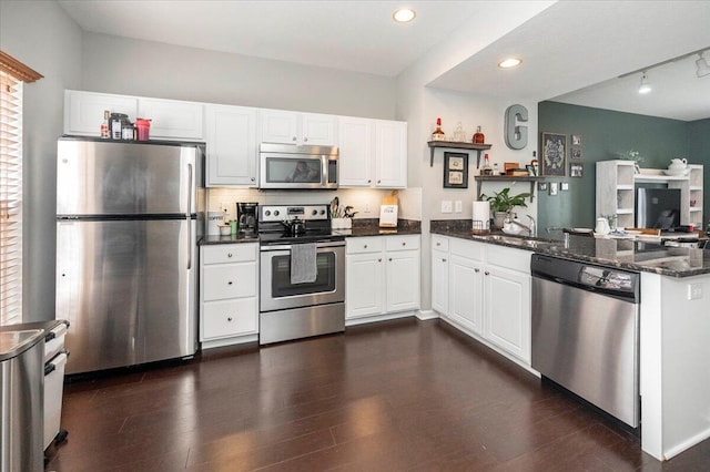2627 Calgary, Lexington, KY 40509 - kitchen featuring stainless steel appliances, baseboards, white cabinetry, and dark wood finished floors
